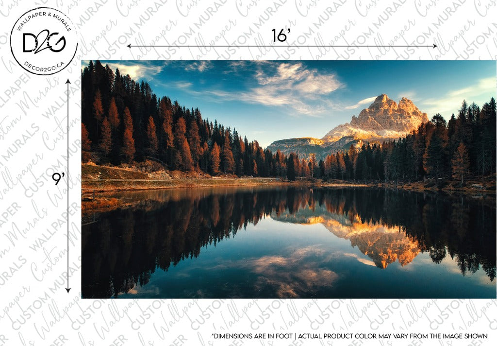 A Decor2Go Tranquil Lake Wallpaper Mural scene at sunset, with a striking reflection of a craggy peak and orange autumn trees in the still water.