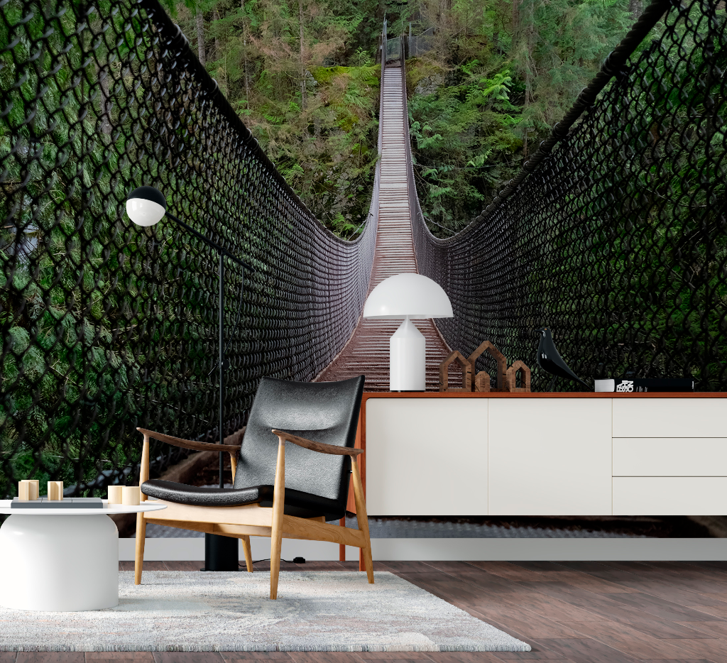 A modern living room with a mid-century armchair and a sleek white sideboard, a lamp on top, facing a large Decor2Go Wallpaper Mural.