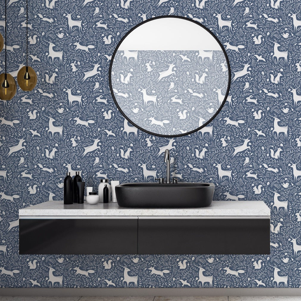 Kids washroom with blue seamless wallpaper