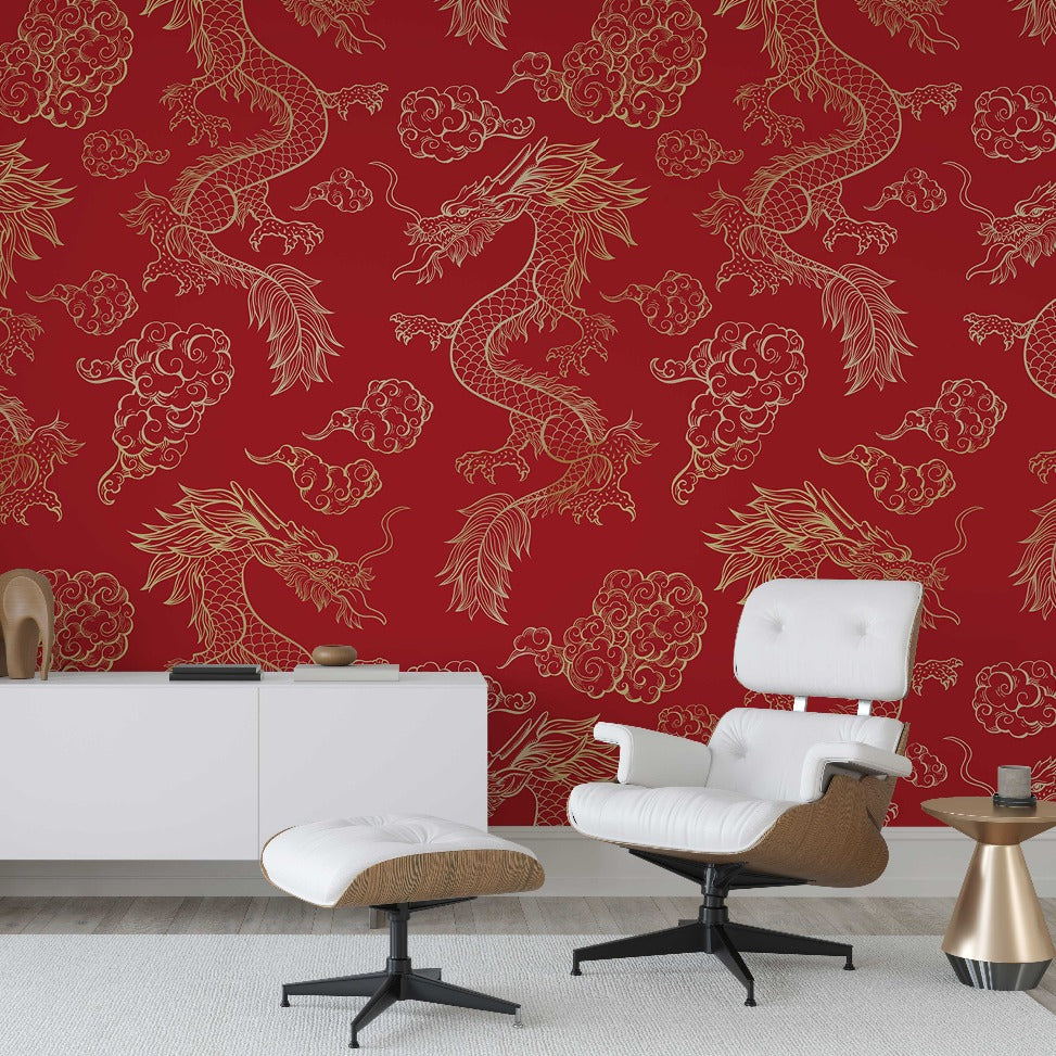 A stylish modern living room featuring a bold Decor2Go Wallpaper Mural with golden dragon designs, complemented by a white lounge chair, matching ottoman, and a minimalist white cabinet.