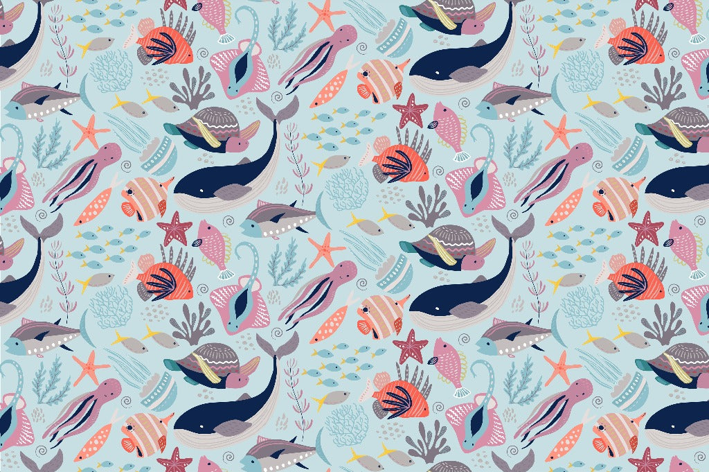 Colorful, seamless Decor2Go Underwater Adventure wallpaper mural featuring an array of stylized sea creatures including whales, dolphins, fish, and seaweed, on a light blue background.