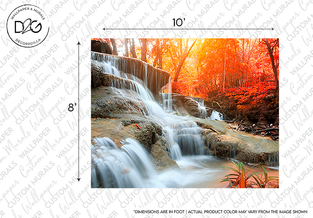 A serene Decor2Go Wallpaper Mural cascades over small ledges surrounded by an autumn forest glowing with orange and red foliage. The water appears smooth and ethereal against the vibrant, textured background of fall colors.