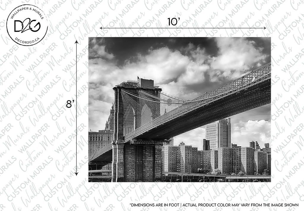 Black and white photography of the iconic landmark, Decor2Go Wallpaper Mural Brooklyn Bridge Wallpaper Mural, leading into the skyline of Manhattan, New York. The image is framed with measurement markings and watermarked for copyright.