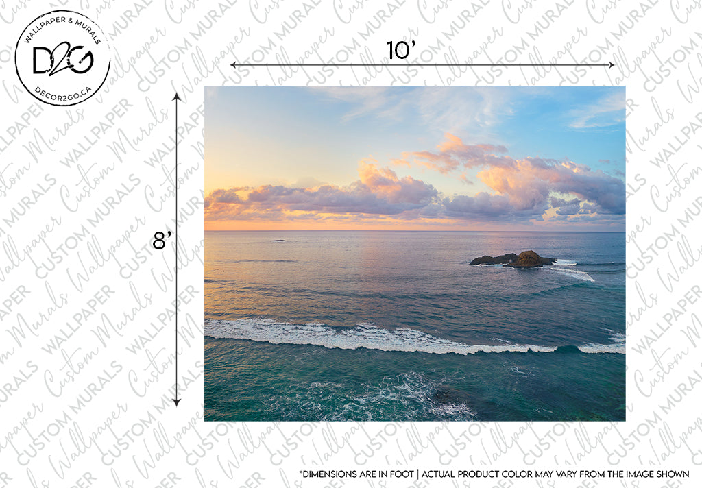 Aerial view of the Great Blue Sea wallpaper mural at sunset, showing gentle waves approaching a rocky outcrop under a vibrant sky with scattered clouds. The image includes a border with measurement markings for custom sizing.