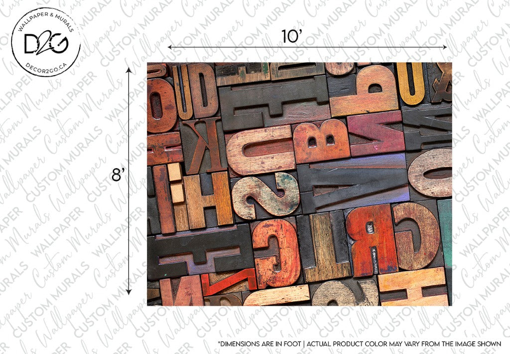 An assortment of old, colorful letterpress type blocks in various fonts and sizes, overlapping each other, displayed from a top-down view as part of a Decor2Go Wallpaper Mural.