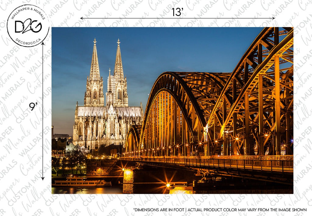 Decor2Go Wallpaper Mural's Bridge and Cathedral View Wallpaper Mural showcases the Illuminated Cologne Cathedral and Hohenzollern Bridge over the Rhine River at night, with bright lights reflecting off the water, highlighting stunning European architecture.