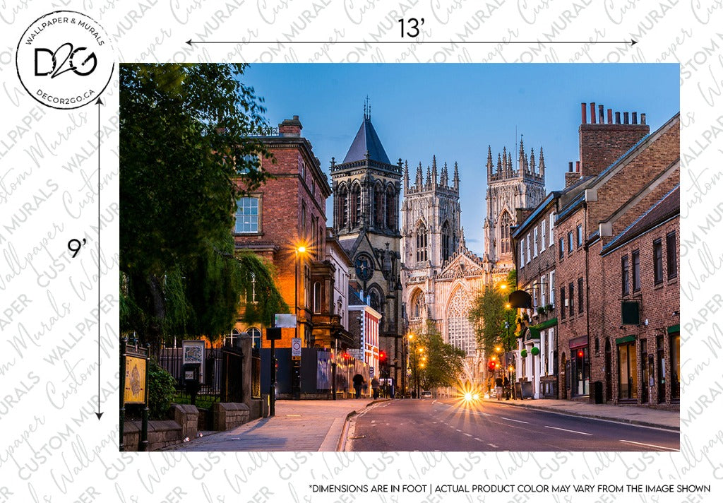 A picturesque evening street scene showcasing the illuminated york minster cathedral against a twilight sky, with cars and traditional buildings lining the street in England can be captured perfectly with the Decor2Go Wallpaper Mural "England Stroll Wallpaper Mural".