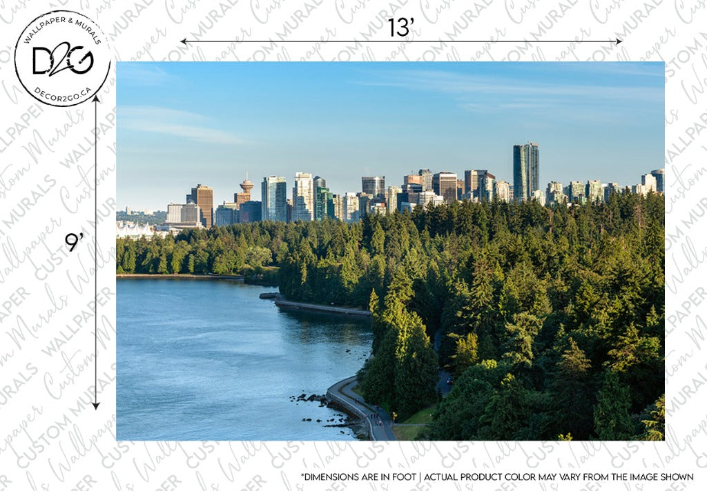 A scenic view of Decor2Go Wallpaper Mural's Vancouver Summer Skyline Wallpaper Mural with modern buildings, viewed over a lush park with dense trees and a curving shore alongside a river, under a clear sky. Watermark and measurement notes for