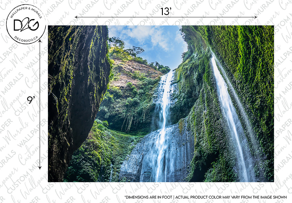 A waterfall streams down a rocky cliff surrounded by lush greenery under a bright sky, with measurement markers and "dimensions are not actual, product color may vary" text indicating an Elevated Waterfall Wallpaper Mural design from Decor2Go Wallpaper Mural.