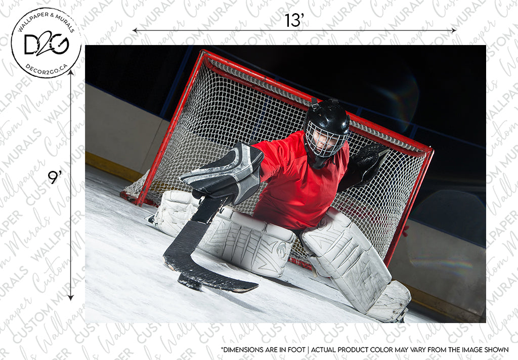 A Decor2Go Wallpaper Mural featuring a hockey goalie in red and black gear crouches in front of the net on the ice, ready to block a shot. Bright studio lighting highlights the player and the net. Watermarks and measurement marks are visible.