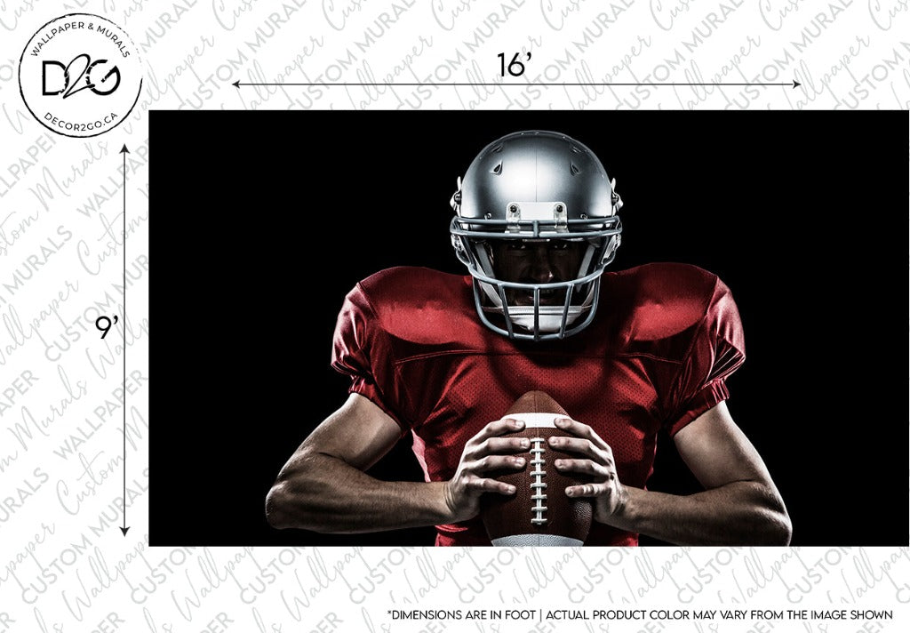 A determined football player in red gear and a silver helmet holds a football, poised and focused under dramatic lighting, with measurements and disclaimers on the edges. This is Decor2Go Wallpaper Mural's Football Player Wallpaper Mural - a sports lover's dream scene.
