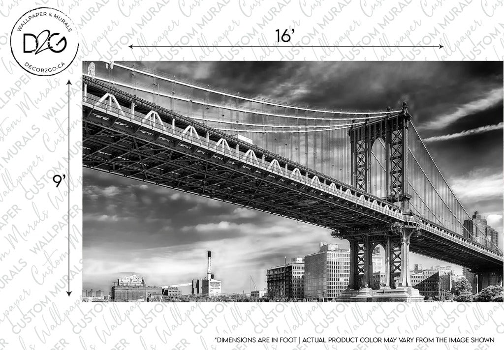 Black and white image of the Decor2Go Wallpaper Mural Manhattan Bridge Wallpaper Mural, a large suspension bridge with city buildings in the background, a watermark and measurement indicators overlaying the photo.
