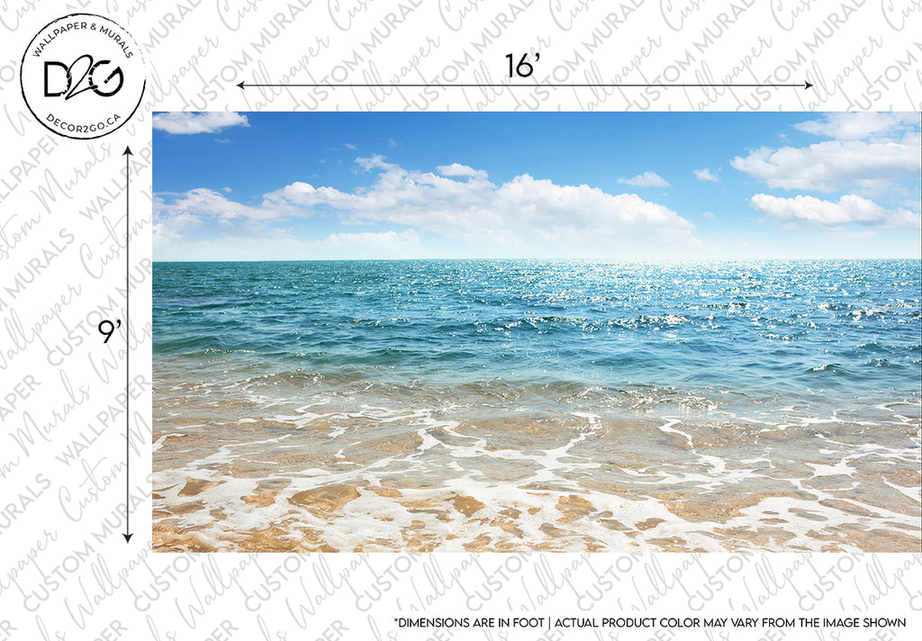 A scenic view of a beach with gentle waves, under a bright blue sky with scattered clouds. The water is clear and sparkles under the sunlight, capturing the essence of a perfect Summer Beach Waves Wallpaper Mural by Decor2Go Wallpaper Mural.