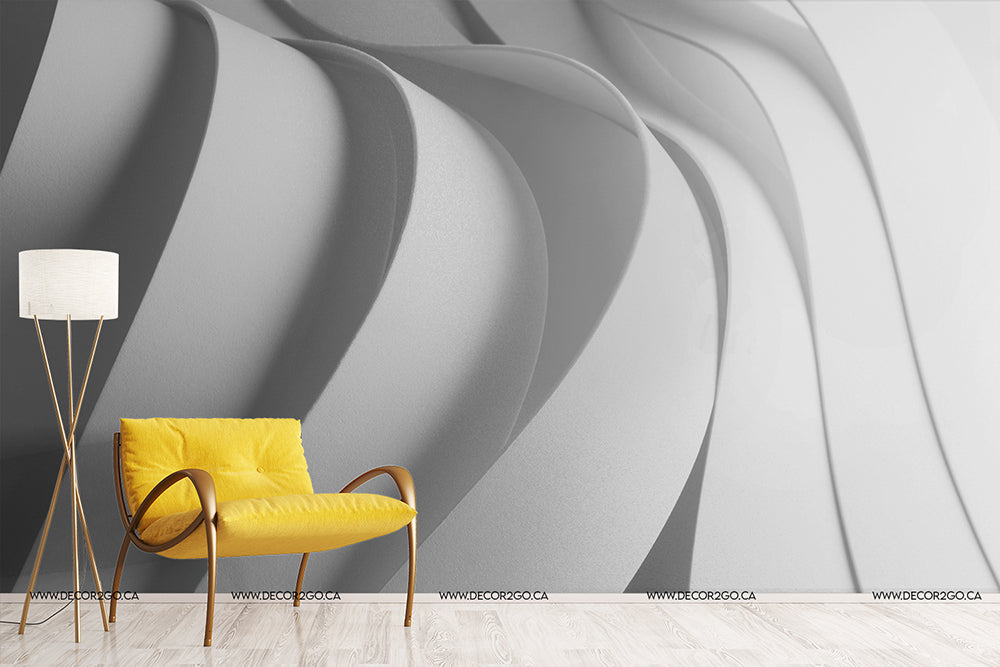 A stylish interior featuring a vibrant yellow chair and a white lamp beside a 3D Dream Cascade Wallpaper Mural by Decor2Go Wallpaper Mural with flowing, abstract art wallpaper.