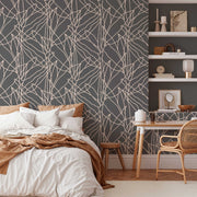 Bedroom - A cozy bedroom featuring a bed with white and tan bedding, Decor2Go Wallpaper Mural with white tree branches, wooden furniture, and shelving with decorative items.