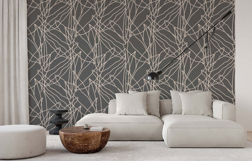 Living Room - A modern living room featuring a white couch with pillows, two round poufs, and a wooden coffee table. The back wall is adorned with Decor2Go Wallpaper Mural.