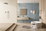 Bathtub with subtle decoration and blue marble wallpaper