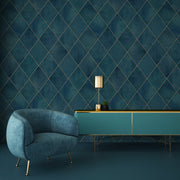 Elegant interior design featuring a plush blue armchair and a long teal console table against a textured dark blue wall with Decor2Go Wallpaper Mural. A stylish lamp and green plant adorn the table.