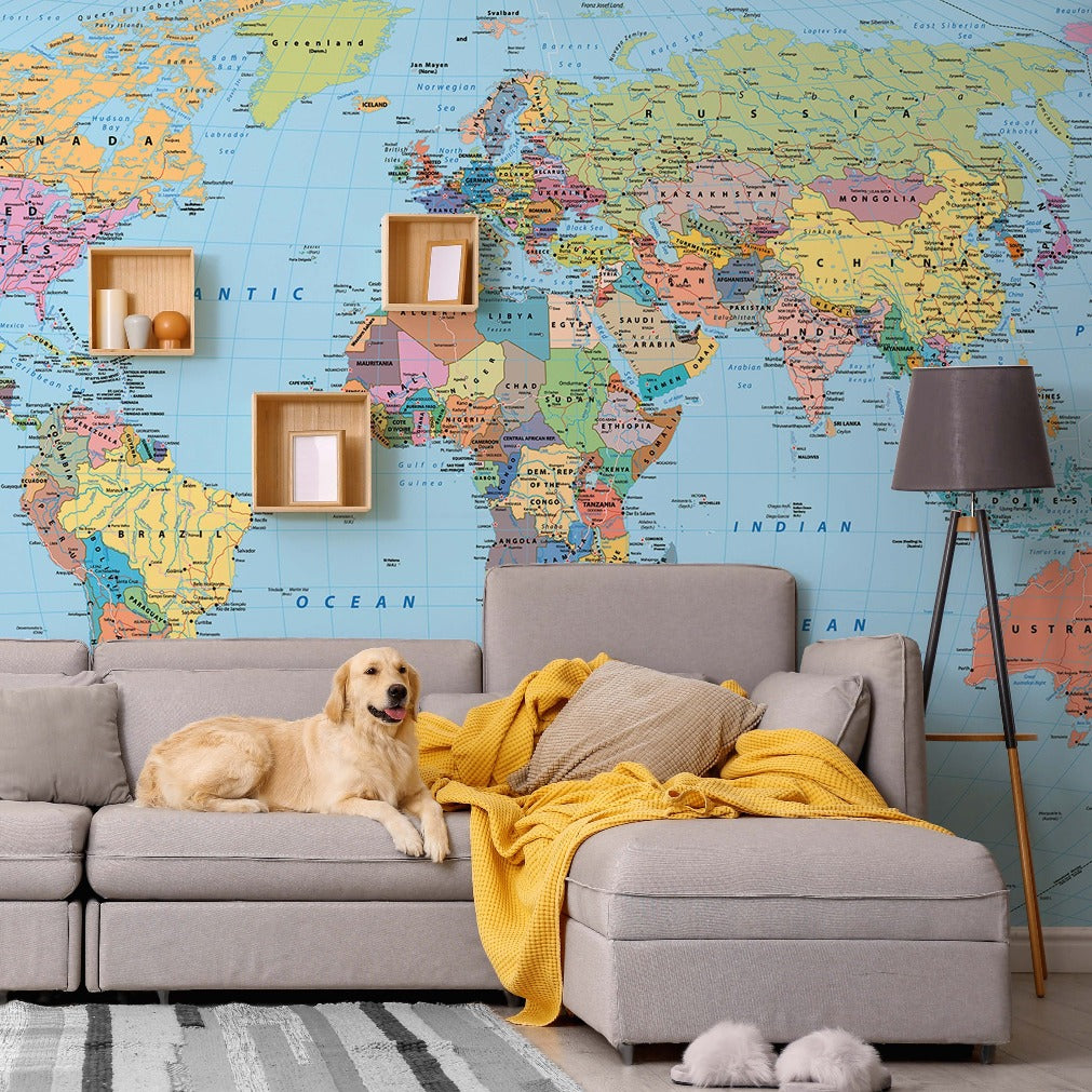 Living room with a dog in the sofa and an atlas wallpaper mural