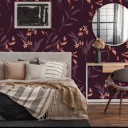 Bedroom - A modern bedroom features a bed with beige linen, cream and black pillows, and a striped throw blanket. A round mirror and a vase with dried flowers sit on a wooden dresser. The background showcases Decor2Go Wallpaper Mural's Autumn Floral Wallpaper Mural. A chair with floral upholstery is also present.