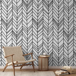 Black and white chevron geometrical wallpaper mural in the bathroom