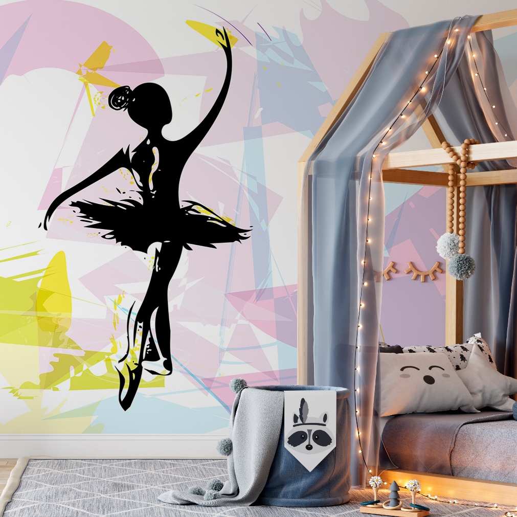 A Ballet Dancer Silhouette Wallpaper Mural from Decor2Go Wallpaper Mural is featured on a nursery wall, accompanied by a canopy bed, whimsical lights, and cozy blankets in a stylized, colorful room.