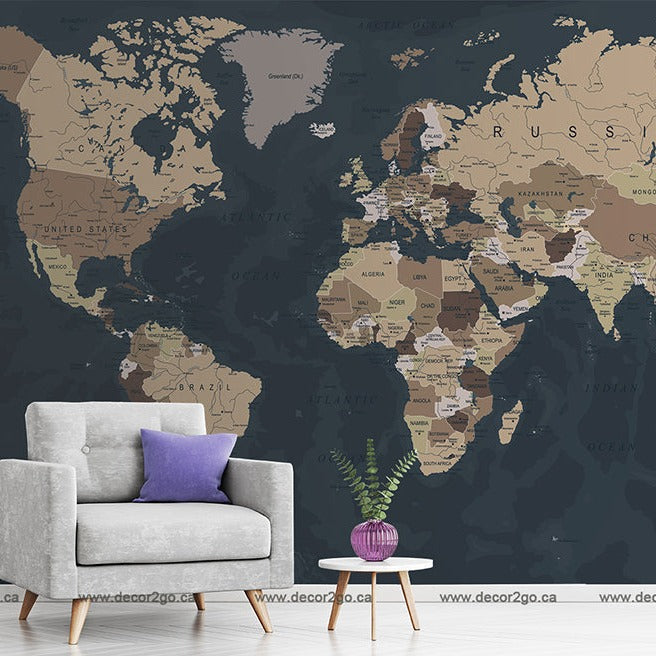 A stylish room featuring a gray armchair and a small round table with a purple potted plant, against a backdrop of Decor2Go Wallpaper Mural in earthy tones.