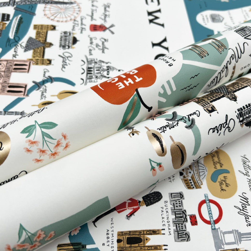 Close-up of Blue/Red City Maps Wallpaper (60 SqFt) by York Wallcoverings, featuring colorful illustrations and famous landmarks—ideal for travel-themed wall decor or vibrant city maps wallpaper.