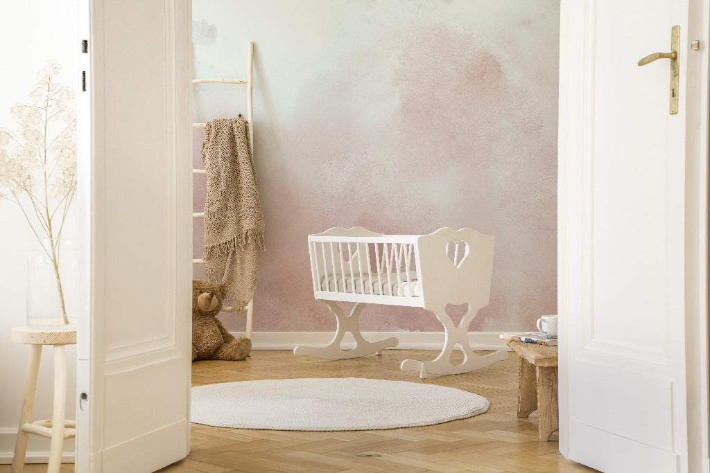 Blush Watercolor Wallpaper Mural in a baby's cozy room