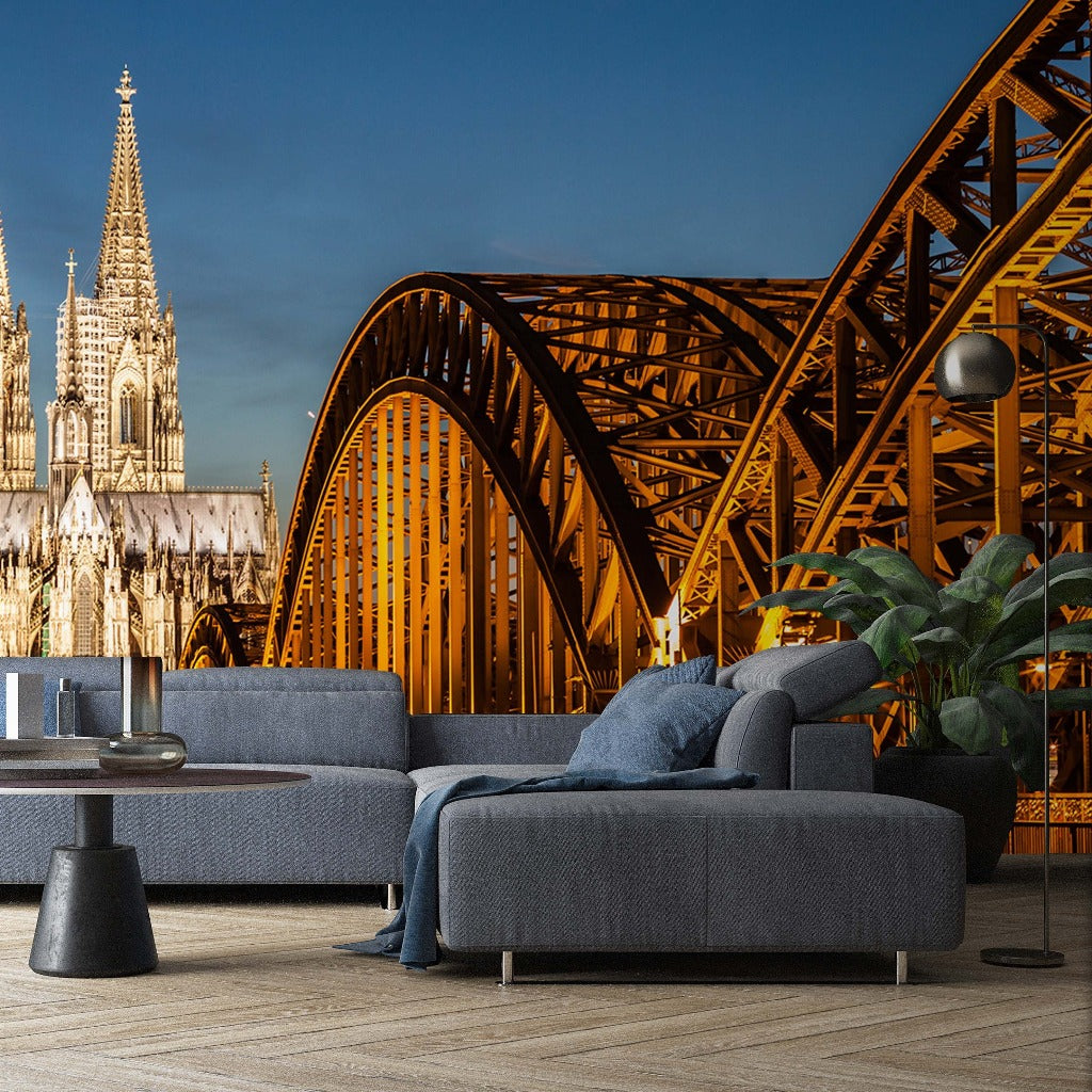 Living Room - A modern living room with a gray sectional sofa and a minimalistic coffee table set against a surreal backdrop of European architecture, including Decor2Go Wallpaper Mural's Bridge and Cathedral View Wallpaper Mural.