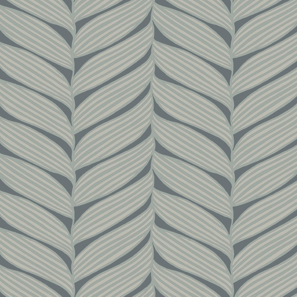 The Charcoal & Silver Luminous Leaves Wallpaper by York Wallcoverings features overlapping diagonal leaf shapes in light blue and white on a dark teal background, creating a repeating herringbone pattern with subtle metallic accents, covering 60 SqFt.