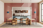 Dining room and kitchen with pink wallpaper 