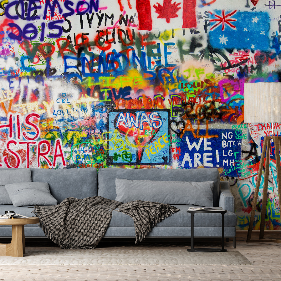 A couch and lamp in front of a wall with a Decor2Go Wallpaper Mural.