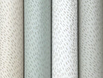 Four rolls of York Wallcoverings’ Dew Drop White Wallpaper (60 SqFt each) feature a subtle vertical dashed line pattern in soft, muted shades of beige, green, white, and gray.