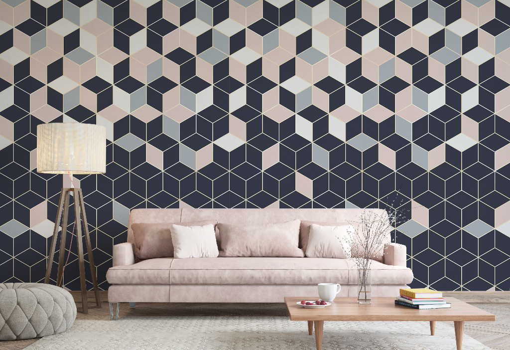 Living Room - A stylish living room featuring a blush pink sofa with white cushions, a wooden coffee table with items on it, and a Decor2Go Wallpaper Mural in navy and pastel colors.