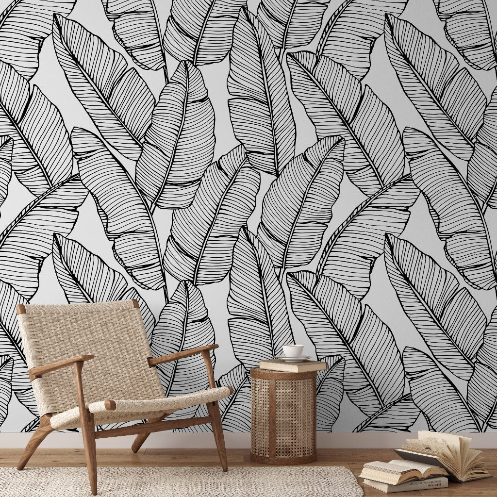 Feather Silhouettes Wallpaper Mural in the living room black and white leaves
