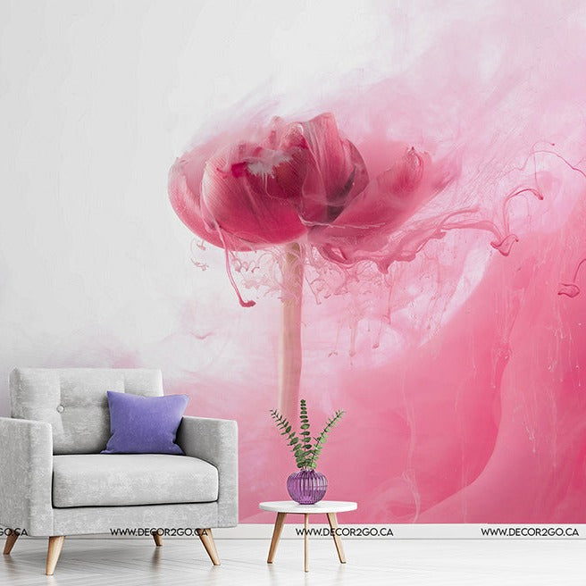 Living Room - A minimalist living room with a gray armchair, a small round table with a potted plant, set against a wall with striking Decor2Go Floral Blush Wallpaper Mural.