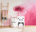 A cozy corner with a wooden ladder holding blankets, a canvas bag with eyelashes design, and a panda painting against a Decor2Go Wallpaper Mural.