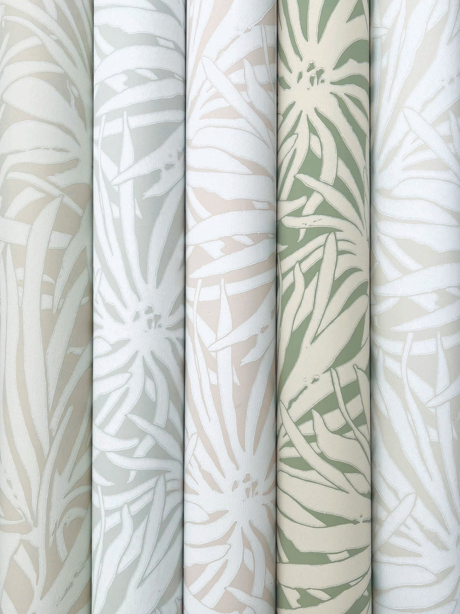 Five rolls of York Wallcoverings Floral Canopy Linen Wallpaper (60 SqFt) are lined up vertically, displaying abstract leaf and floral patterns in soft beige, white, and green for a subtle, natural look.