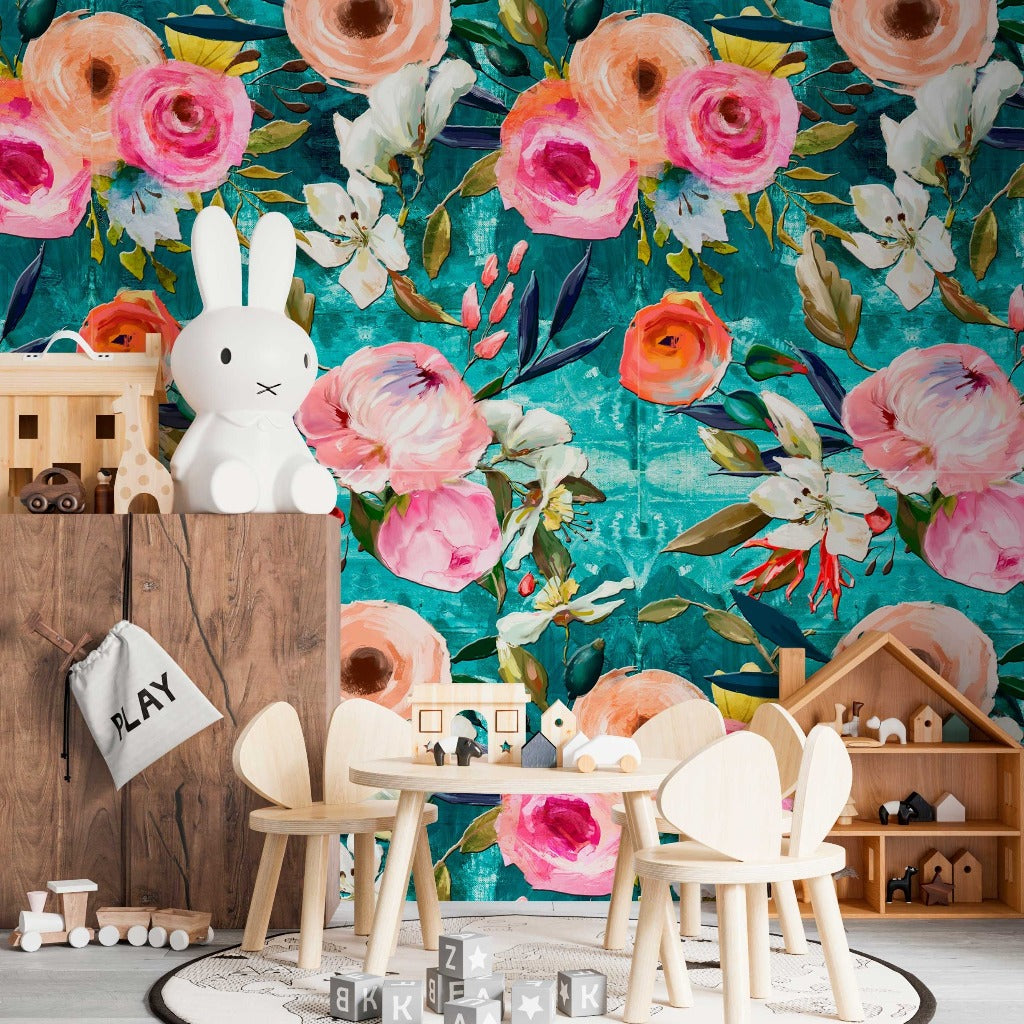 A vibrant children's playroom featuring a Decor2Go Wallpaper Mural backdrop and a wooden play table set with chairs. A white rabbit figurine, alphabet blocks, and a miniature dollhouse enhance the playful decor.