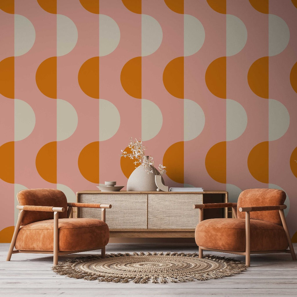 A stylish living room with a Decor2Go Wallpaper Mural in pastel colors, featuring a mid-century modern sofa flanked by two armchairs, and decorative vases with dried plants.