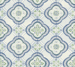 Ornate tile pattern featuring a repeating design of blue and green floral motifs within diamond shapes. The tiles have intricate detailing and are arranged in a seamless geometric pattern, perfect for creating York Wallcoverings Garden Trellis Ochre Wallpaper Yellow (60 Sq.Ft.) with botanical elegance.