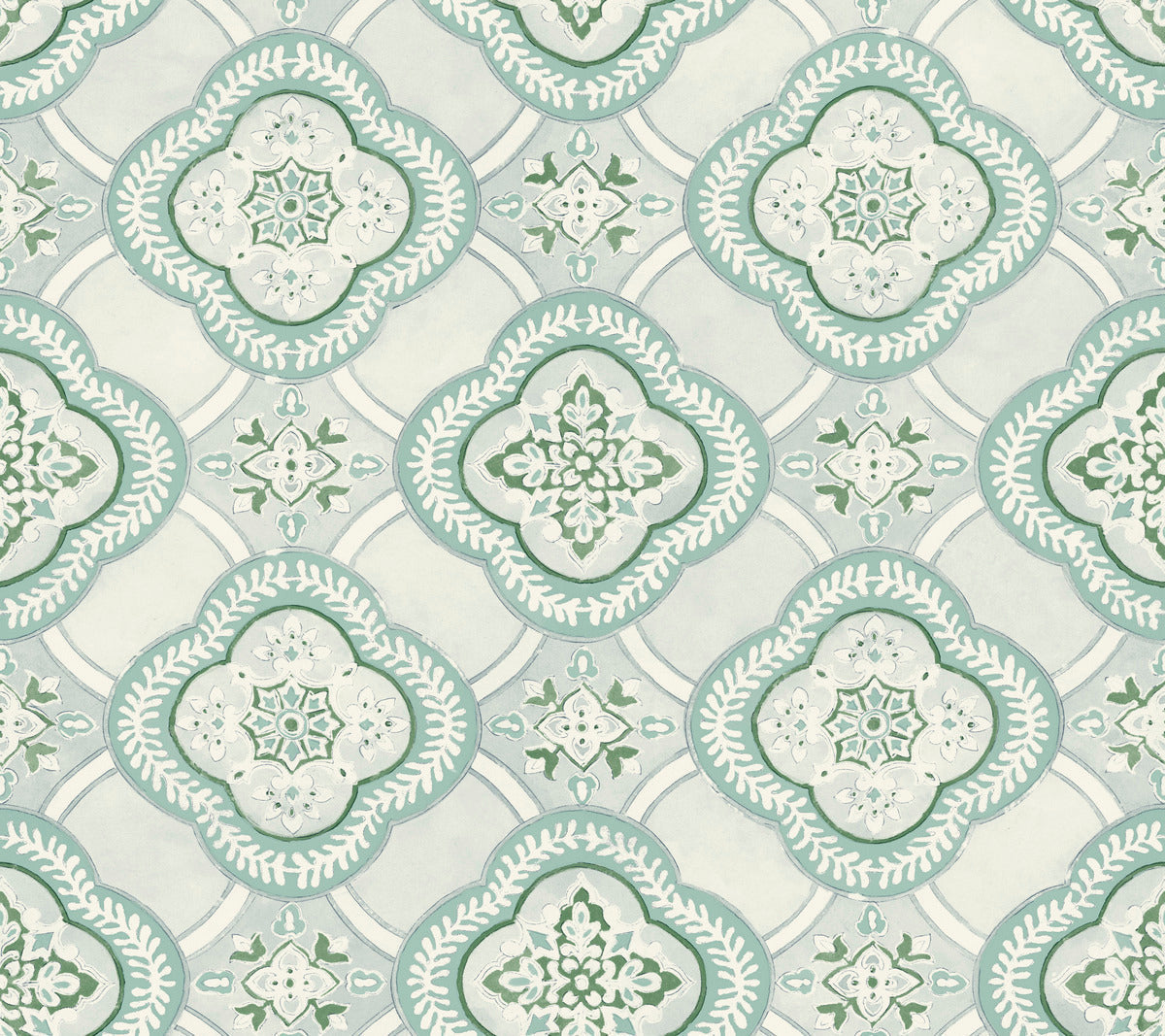 A repeating pattern of intricate, symmetrical designs featuring floral and leaf motifs in shades of green and white on a light blue-gray background. The Garden Trellis Ochre Wallpaper Yellow (60 Sq.Ft.) by York Wallcoverings design has a vintage, tile-like appearance, reminiscent of traditional Mediterranean or Moroccan styles.