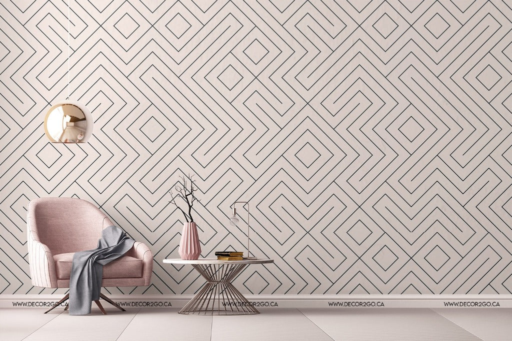 Chair with gold lighting and a soft wallpaper with a maze pattern