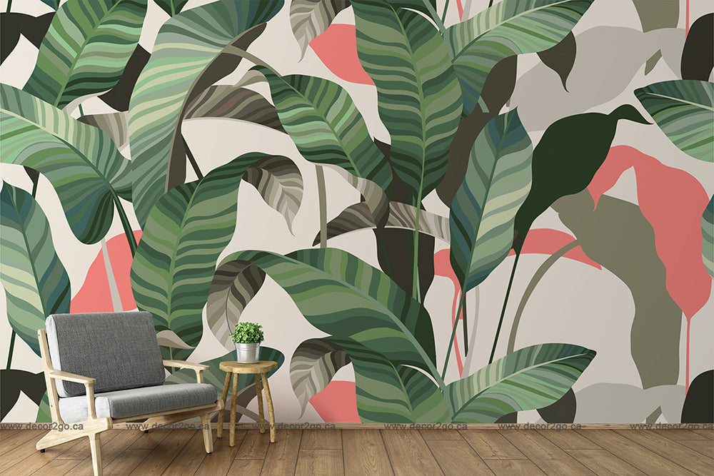 A stylish interior featuring a gray armchair and a small wooden side table with a plant, set against a Decor2Go Wallpaper Mural in shades of green, pink, and gray.