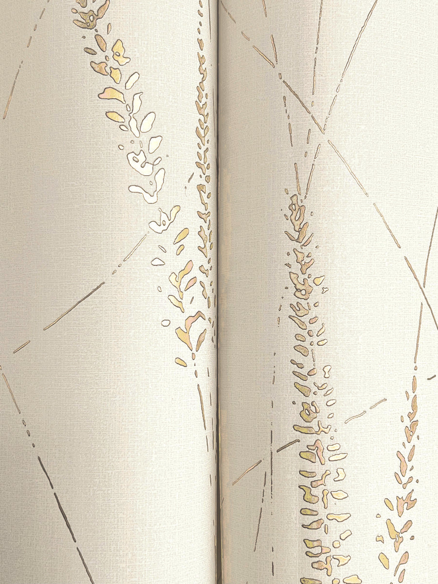 Close-up of Graceful Willow Cotton Wallpaper by York Wallcoverings (60 SqFt), a textured light beige metallic gold wallpaper with an abstract pattern of gold and tan botanicals and thin intersecting lines for a subtle, elegant look.
