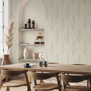 Dining Room - A modern area with wooden chairs, open shelves, and a tall vase is enhanced by Graceful Willow Stone Wallpaper (60 SqFt) from York Wallcoverings, bringing a subtle yet elegant botanical touch to the space