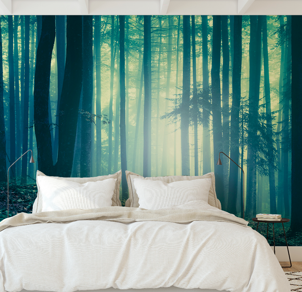Green Silhouetted Forest Wallpaper Mural in a cozy bedroom