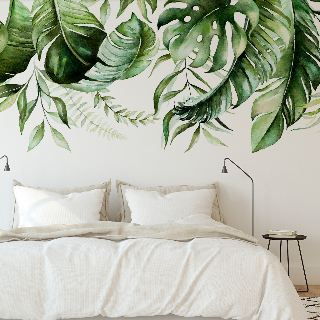 Bedroom - A minimalist bedroom with white bedding and pillows on a bed, flanked by black bedside lamps, against a wall adorned with the Decor2Go Wallpaper Mural "Green is in the air" Wallpaper Mural.