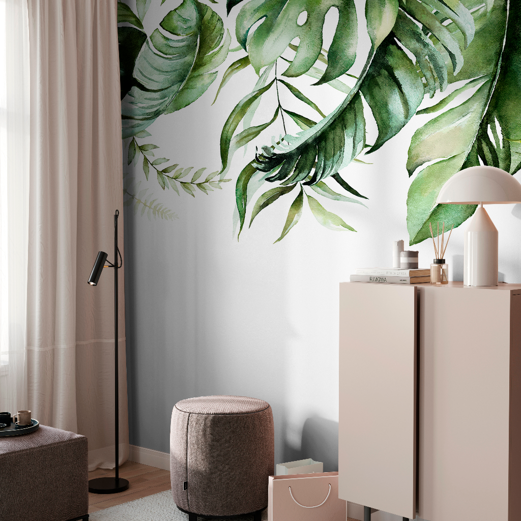 A stylish room corner with a beige dresser, beige stool, and a standing lamp next to a curtain with a large, Green is in the air Wallpaper Mural on a light background.